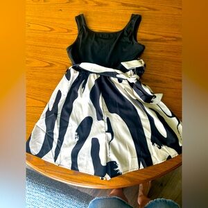 Woman's black/beige romper